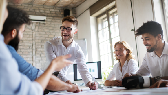 Five people in a meeting