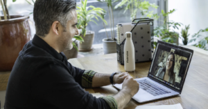 Person talks with someone on video call